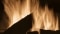 Illustration de flammes vacillantes dans une chaudière à combustible solide Viessmann.